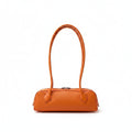 Alaïa Pebbled Leather Shoulder Bag – Orange