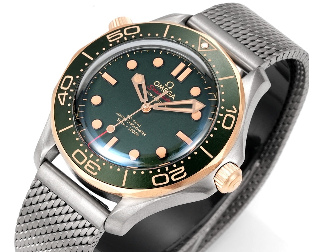 Omega Seamaster Diver 300M – Steel Yellow Gold Green Ceramic Bezel Green Dial Mesh Bracelet 007 Edition