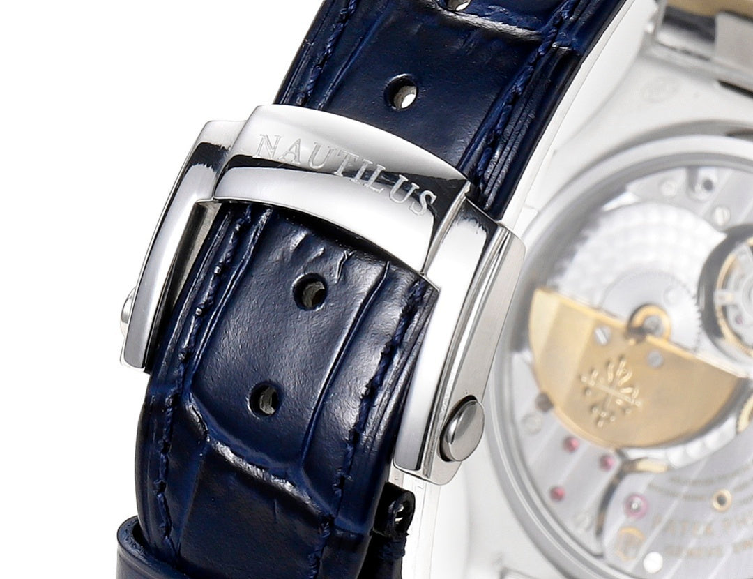Patek Philippe Nautilus 5726 Annual Calendar – White Gold Baguette Diamond Bezel Blue Dial Moon Phase Blue Crocodile Strap
