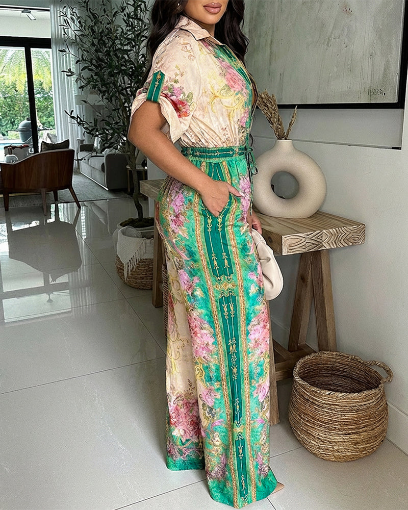Jumpsuit mit Blumendruck im Vintage-Stil, Umlegekragen, Krempelärmeln, Knopfleiste vorne, lässigem Kordelzug in der Taille und weitem Bein für den Urlaub