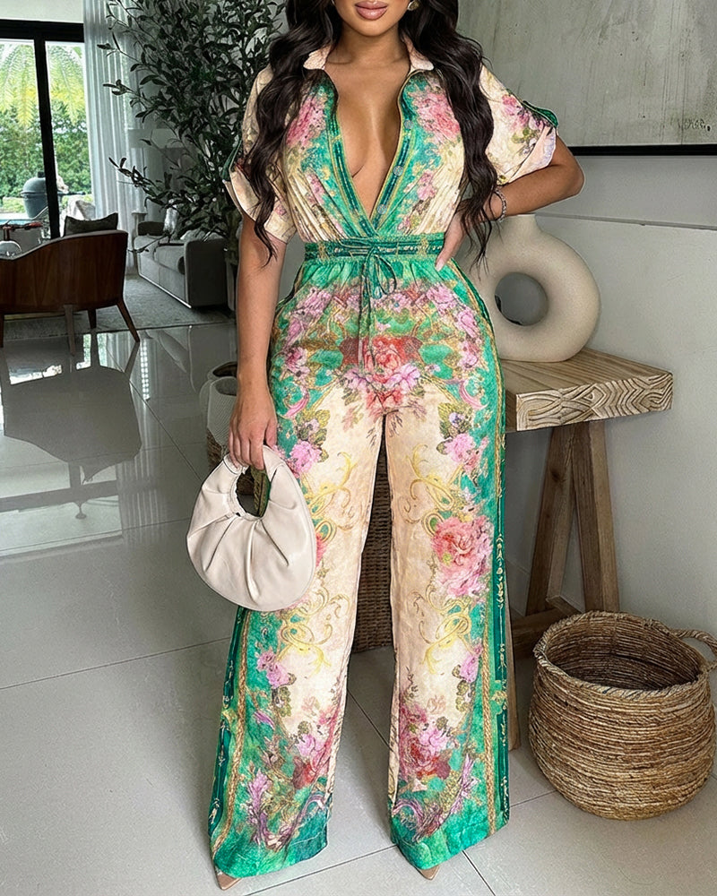 Jumpsuit mit Blumendruck im Vintage-Stil, Umlegekragen, Krempelärmeln, Knopfleiste vorne, lässigem Kordelzug in der Taille und weitem Bein für den Urlaub