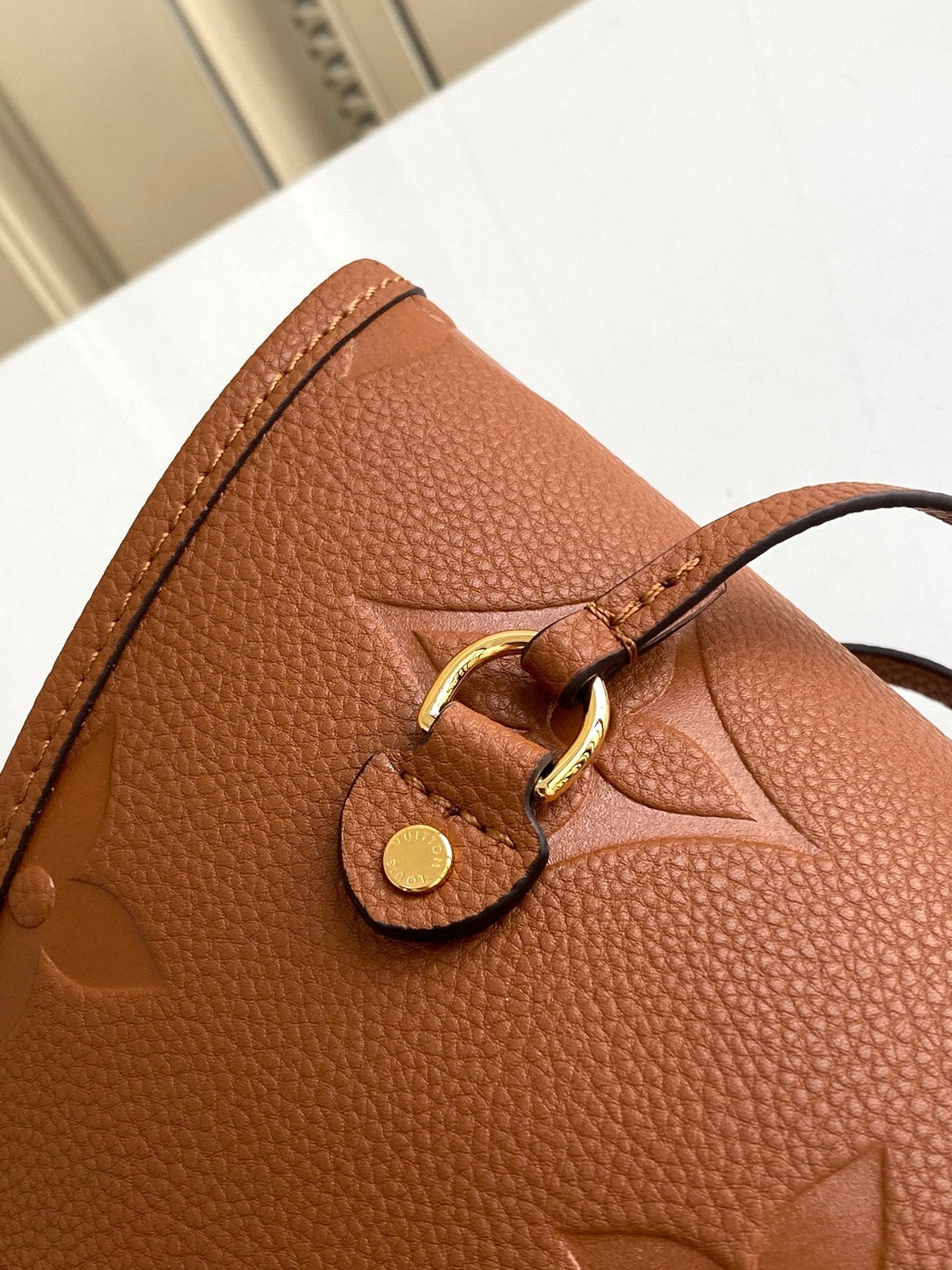 NEVERFULL MM 32 BRAUN MONOGRAM EMPREINTE LEDER