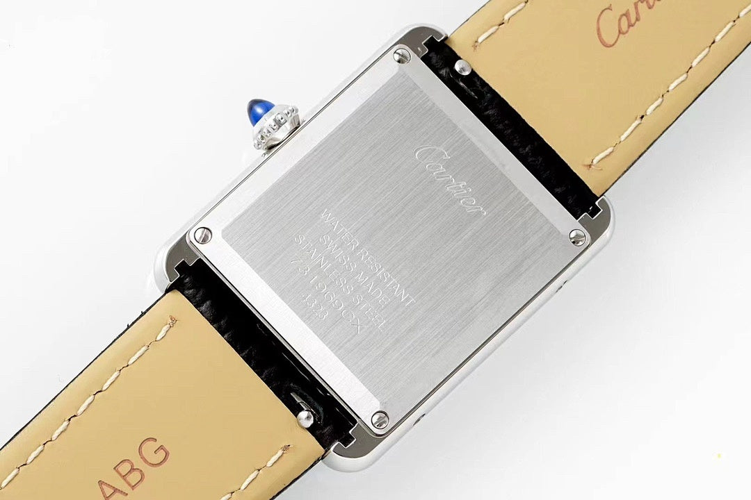 Cartier Tank – Steel White Roman Numeral Dial Blue Sword Hands Sapphire Crown Black Leather Strap