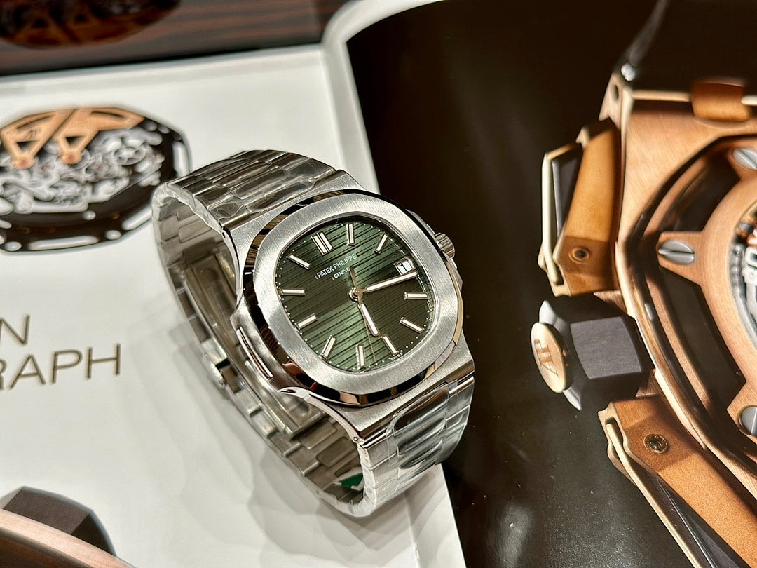 Patek Philippe Nautilus 5711 – Steel Olive Green Dial Baton Indices Date Integrated Steel Bracelet