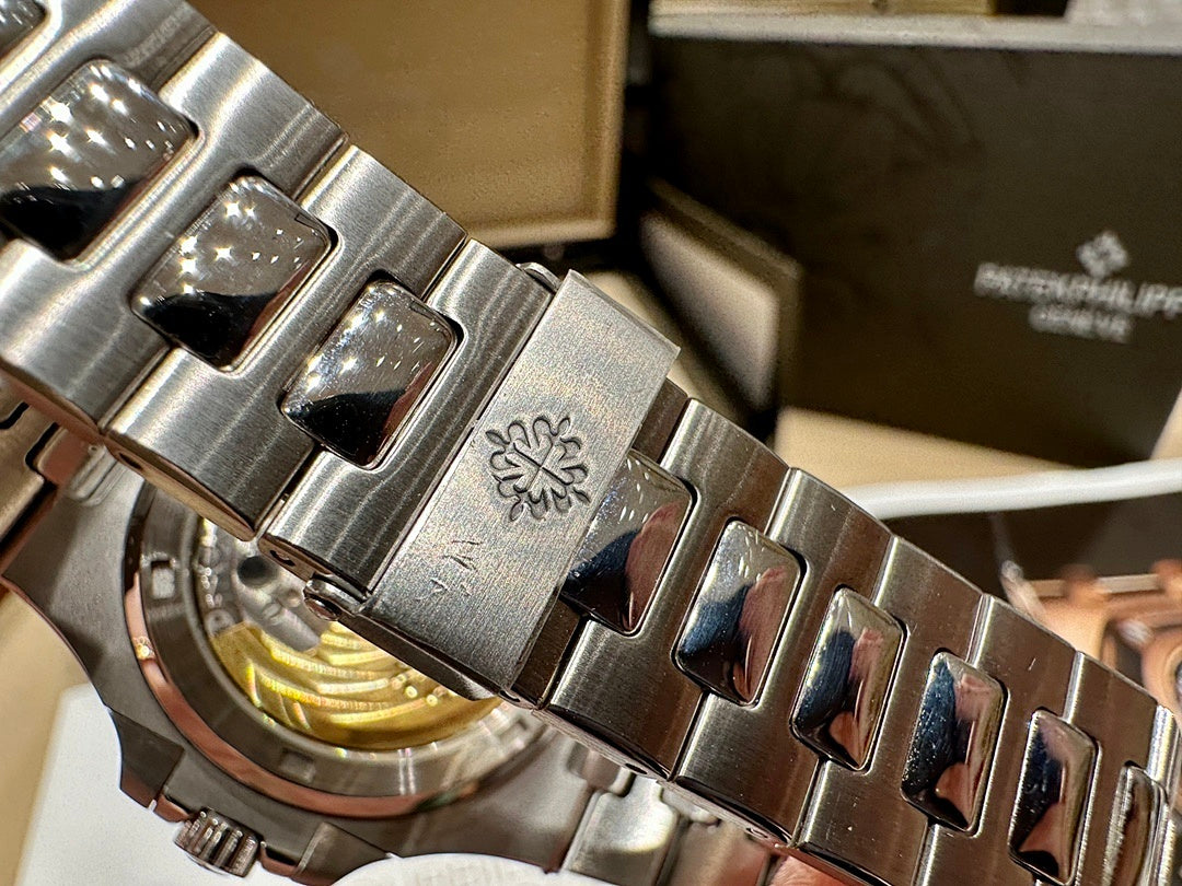 Patek Philippe Nautilus 5711 – Steel Olive Green Dial Baton Indices Date Integrated Steel Bracelet
