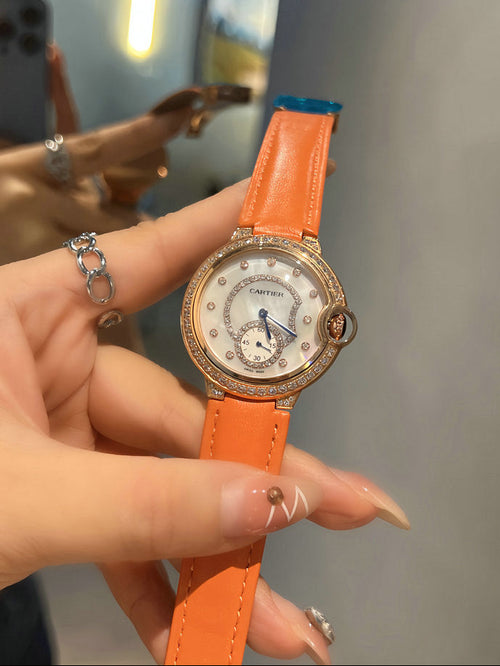 Montre Cartier Ballon Bleu — Or rose et orange