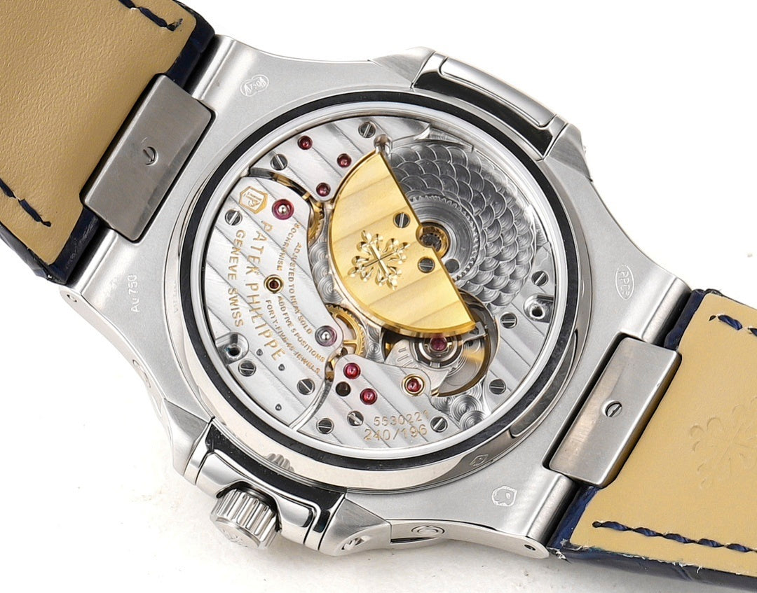 Patek Philippe Nautilus 5726 Annual Calendar – White Gold Baguette Diamond Bezel Blue Dial Moon Phase Blue Crocodile Strap