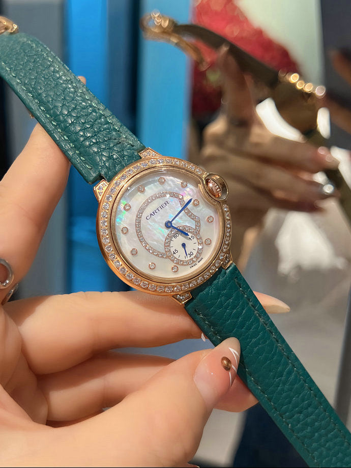 Cartier Ballon Bleu Watch — Diamond Bezel, Mother-of-Pearl & Green Strap