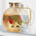Round 84-Ounce Glass Pitcher with Concentric Texture, Side Handle and Golden or Gray Accent Lid
