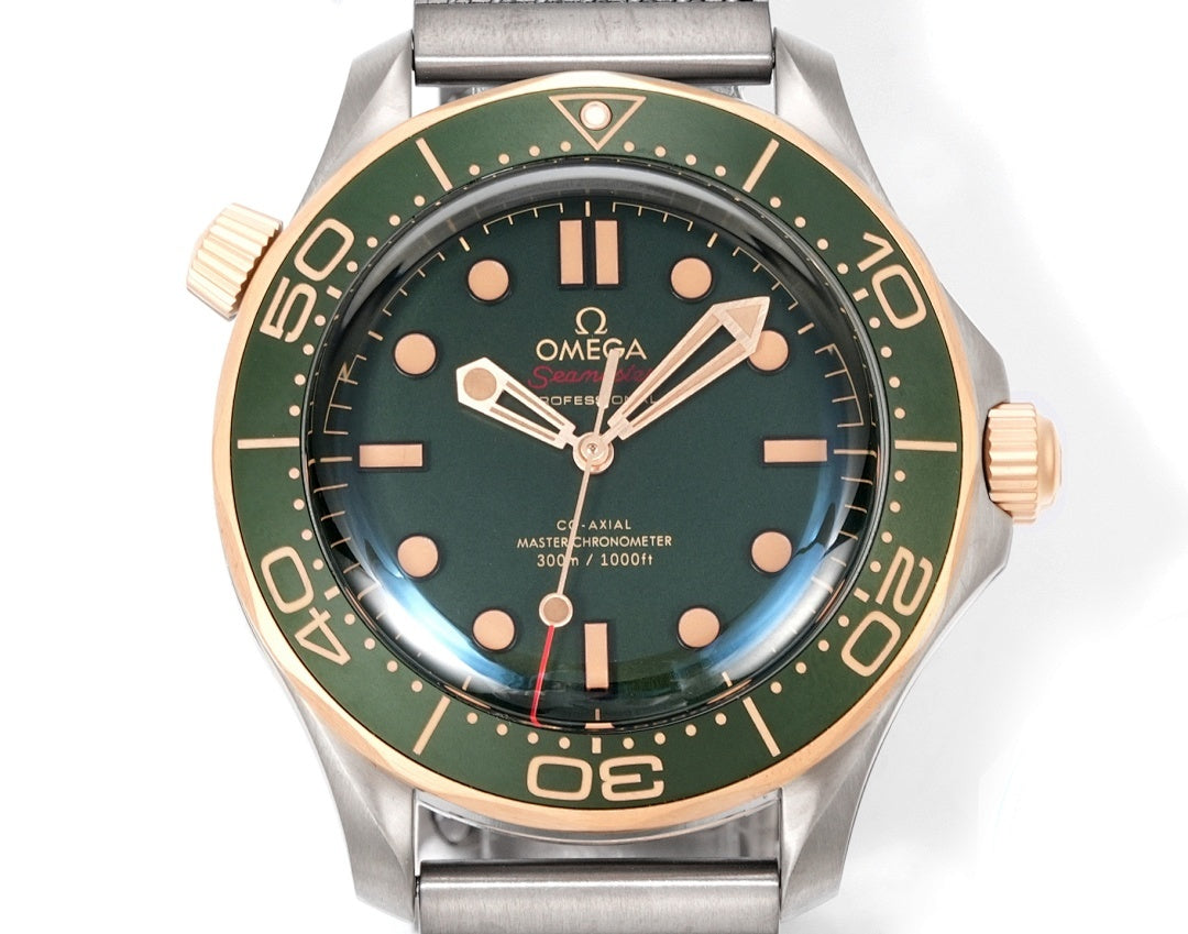 Omega Seamaster Diver 300M – Steel Yellow Gold Green Ceramic Bezel Green Dial Mesh Bracelet 007 Edition