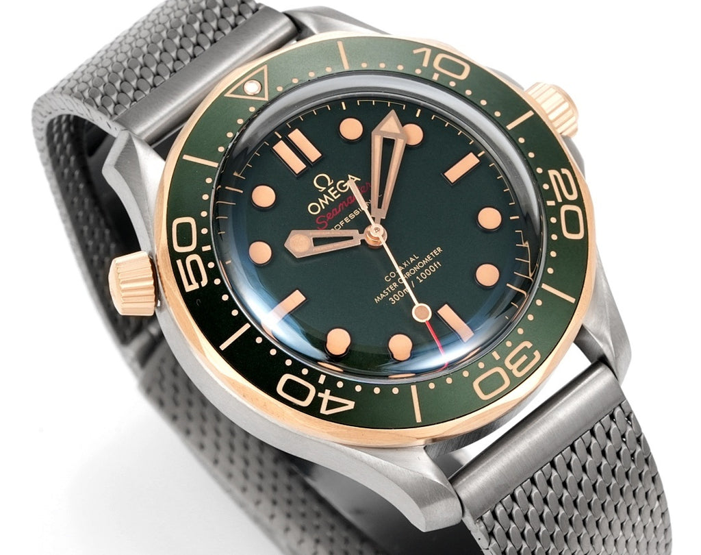 Omega Seamaster Diver 300M – Steel Yellow Gold Green Ceramic Bezel Green Dial Mesh Bracelet 007 Edition