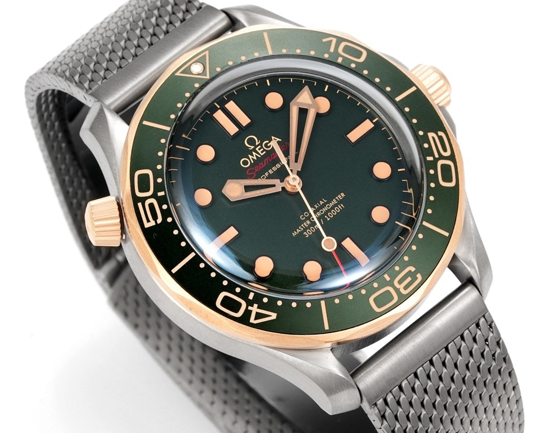 Omega Seamaster Diver 300M – Steel Yellow Gold Green Ceramic Bezel Green Dial Mesh Bracelet 007 Edition