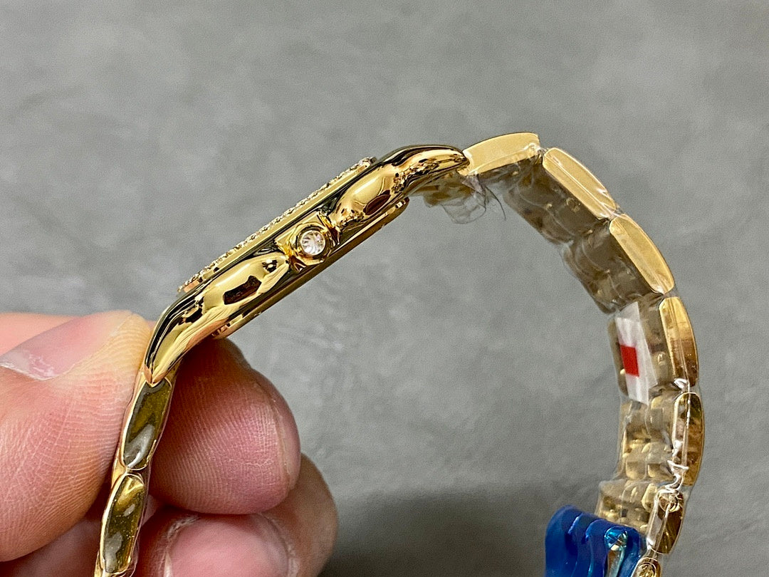 Cartier Panthère de Cartier – Yellow Gold Diamond Bezel White Roman Numeral Dial Blue Sword Hands Gold Panthère Bracelet