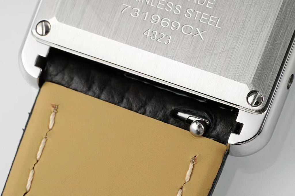Cartier Tank – Steel White Roman Numeral Dial Blue Sword Hands Sapphire Crown Black Leather Strap
