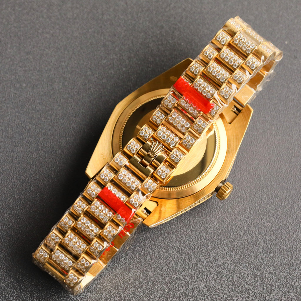 Rolex Day-Date Iced Out – Yellow Gold Diamond Pavé Dial Ruby Baguette Bezel President Bracelet