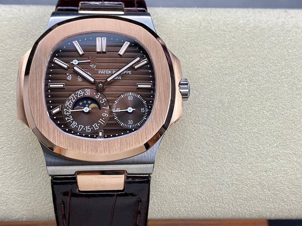 Patek Philippe Nautilus 5712 – Two-Tone Steel Rose Gold Brown Dial Moon Phase Power Reserve Small Seconds Crocodile Strap