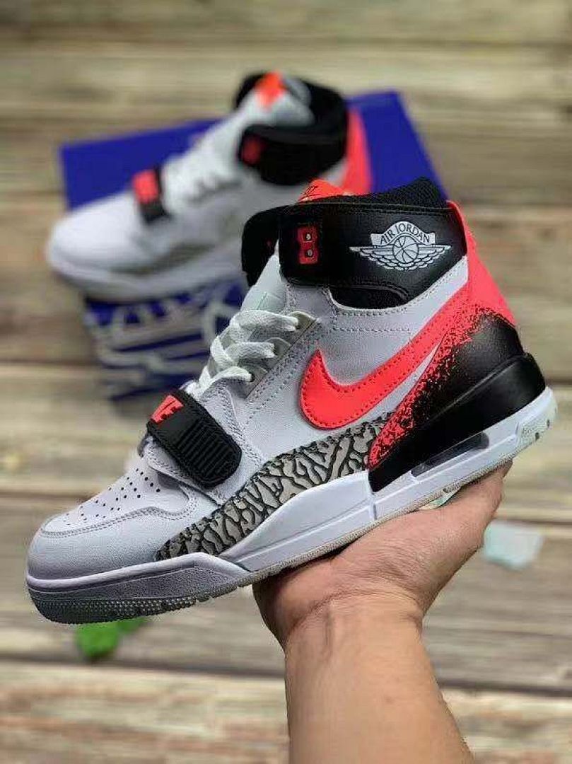 Air Jordan Legacy 312 Hot Punch – White / Hot Punch / Black / Cement