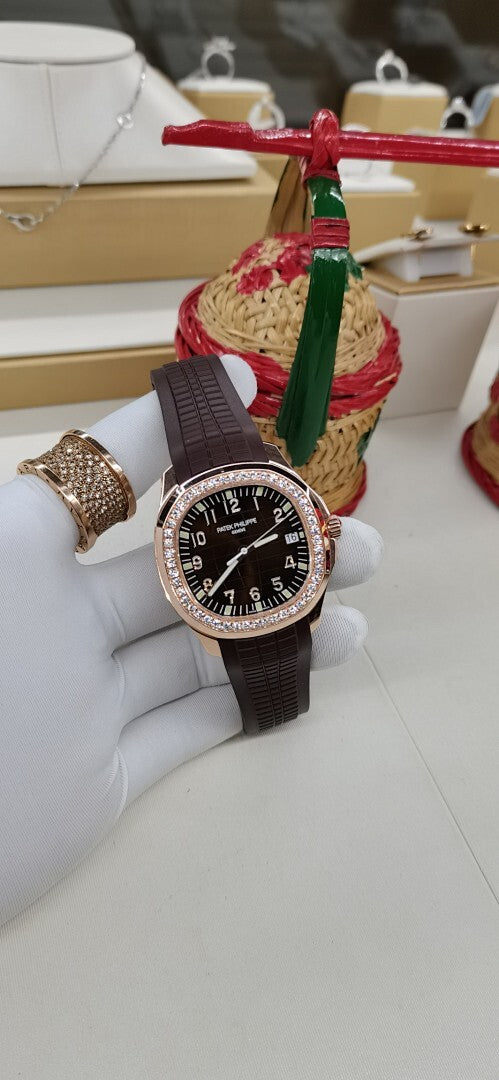 Patek Philippe Aquanaut Luce 5067 – Rose Gold Diamond Bezel Black Dial Arabic Numerals Date Brown Rubber Strap