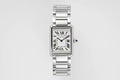 Cartier Tank – Steel White Roman Numeral Dial Blue Sword Hands Sapphire Crown Steel Bracelet