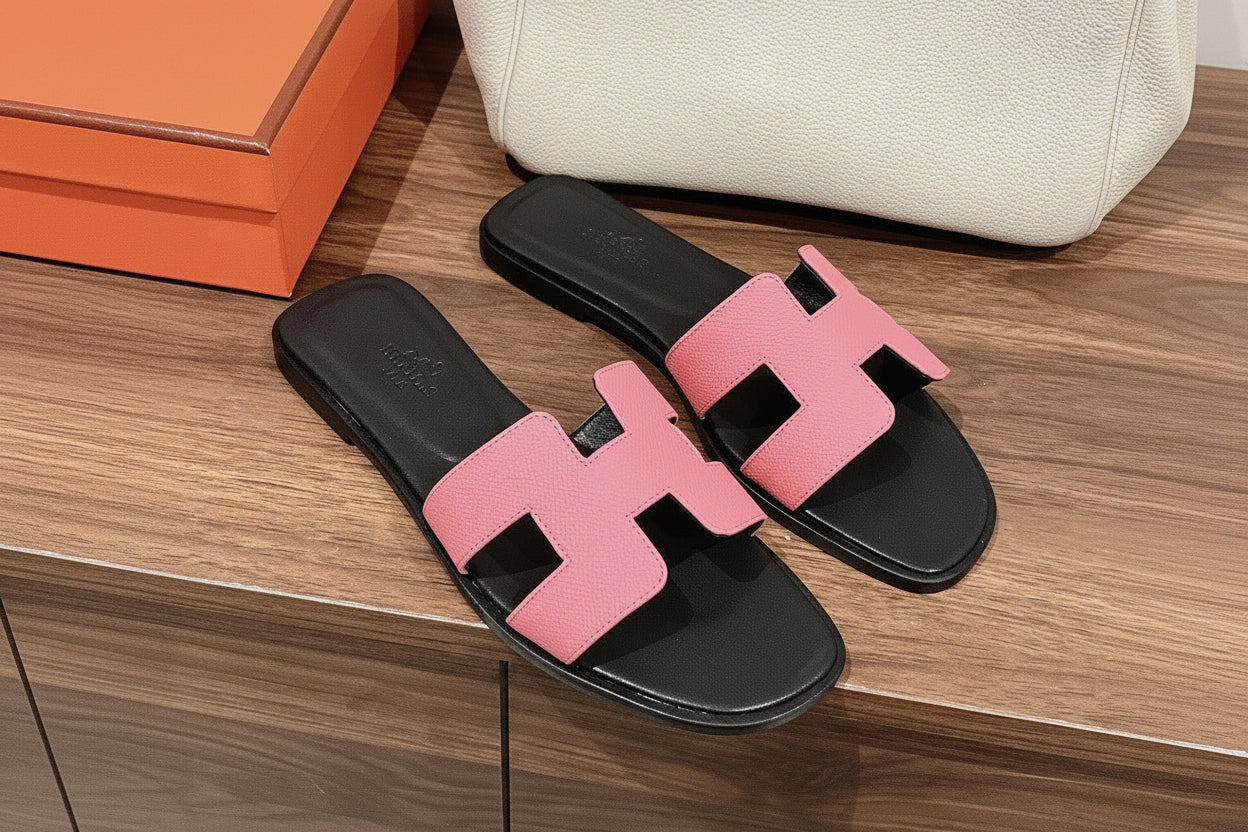 Hermès Oran Flat Sandals — Rose Pink & Black