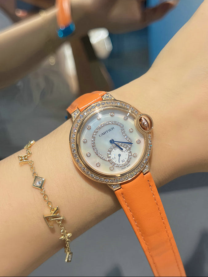 Cartier Ballon Bleu Watch — Orange & Rose Gold