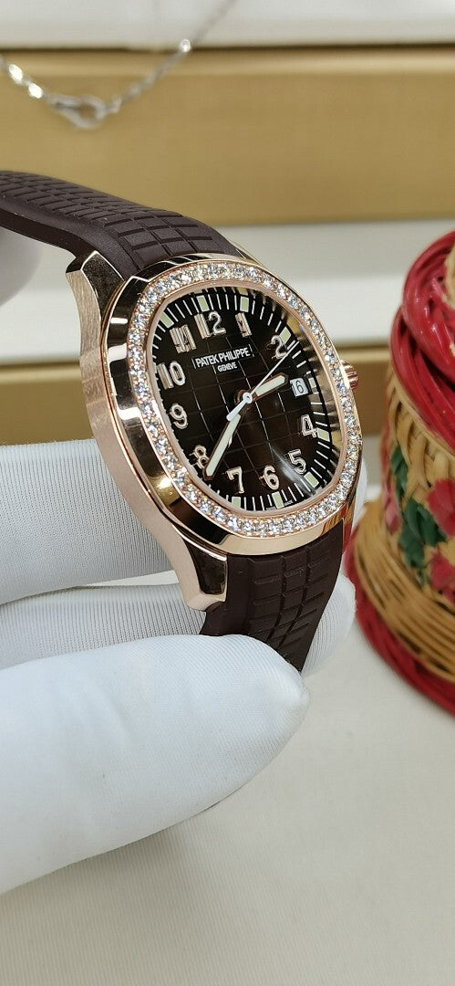 Patek Philippe Aquanaut Luce 5067 – Rose Gold Diamond Bezel Black Dial Arabic Numerals Date Brown Rubber Strap