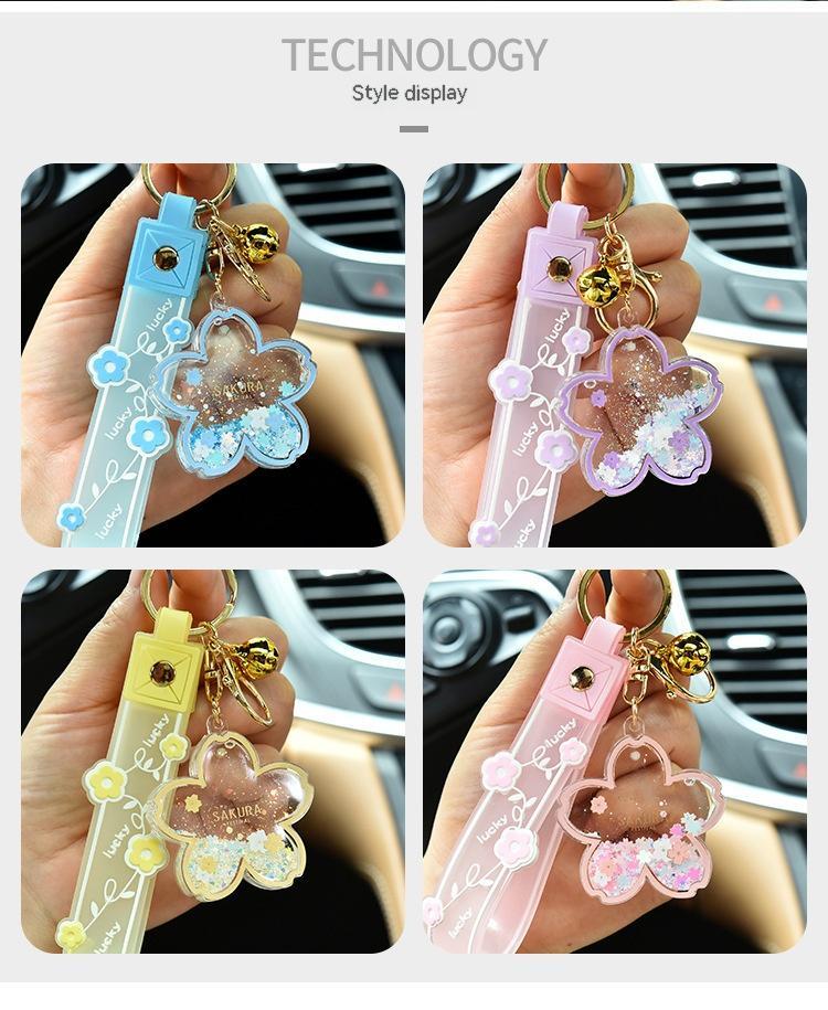 Cartoon-Treibsand-Kirschblüten-Schlüsselanhänger, transparentes Acryl-Öl-Treibflaschen-Taschenanhänger-Set