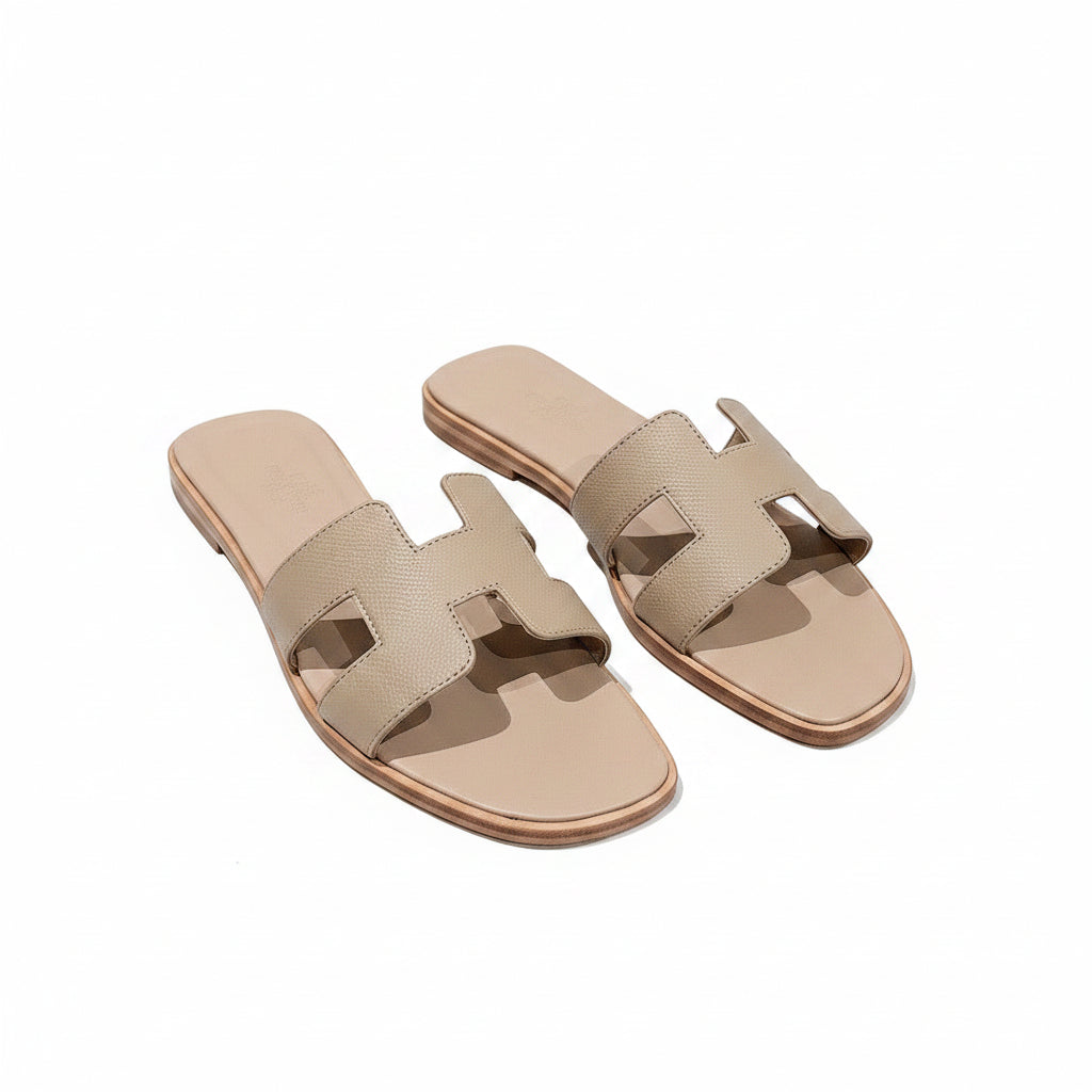 Hermès Oran Flat Sandals — Etoupe Beige