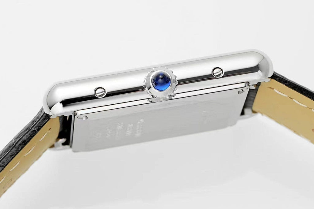 Cartier Tank – Steel White Roman Numeral Dial Blue Sword Hands Sapphire Crown Black Leather Strap
