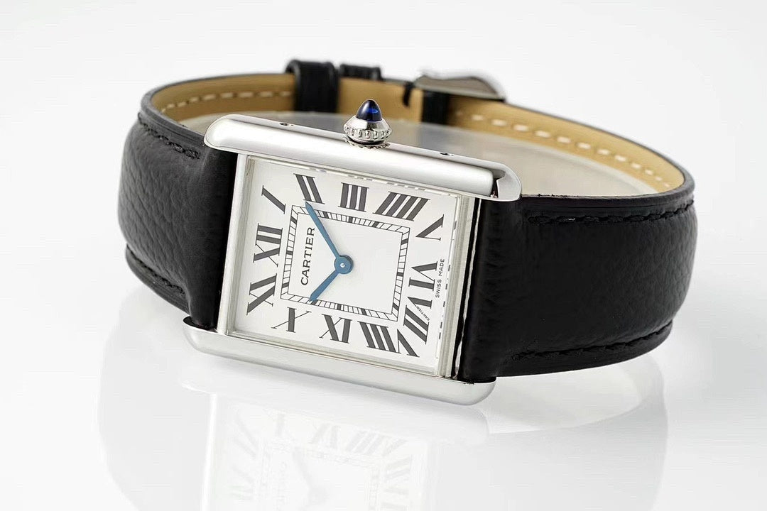 Cartier Tank – Steel White Roman Numeral Dial Blue Sword Hands Sapphire Crown Black Leather Strap