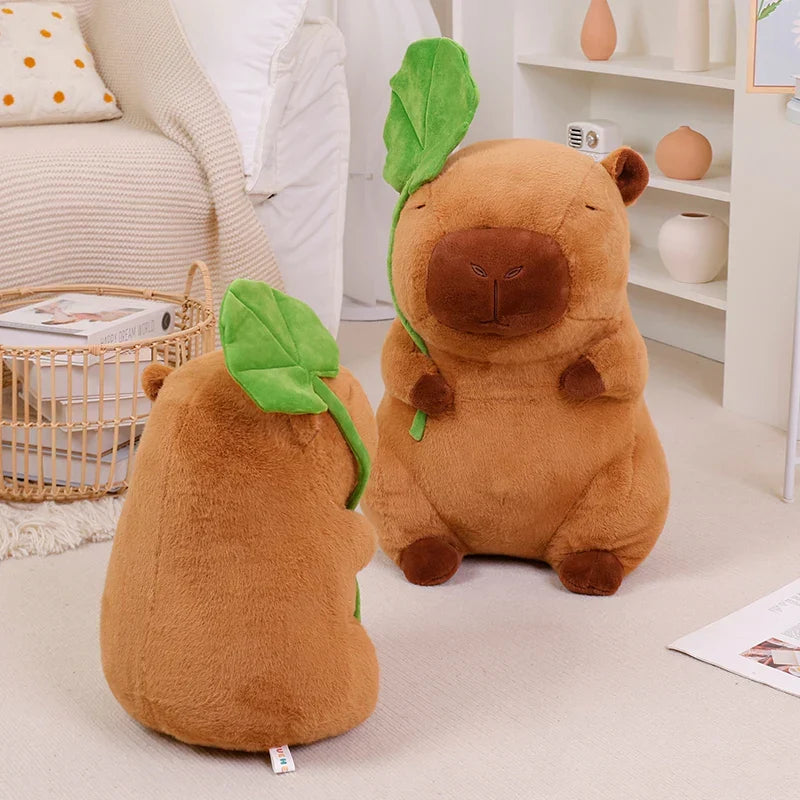 Adorable Kawaii Capybara Plushie Cuddling a Leaf