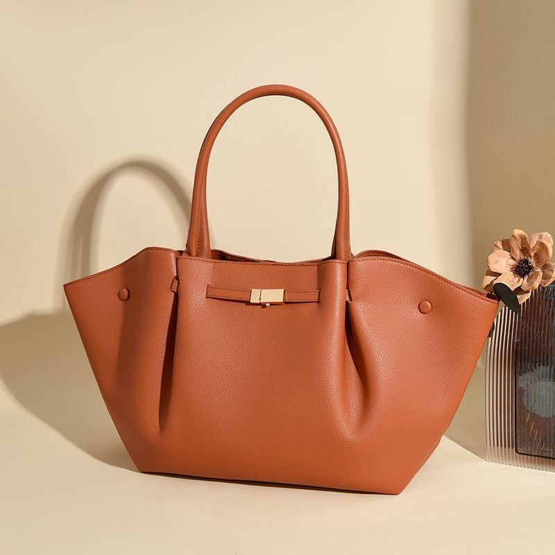 Tan Leather Winged Tote Bag with Bow Clasp