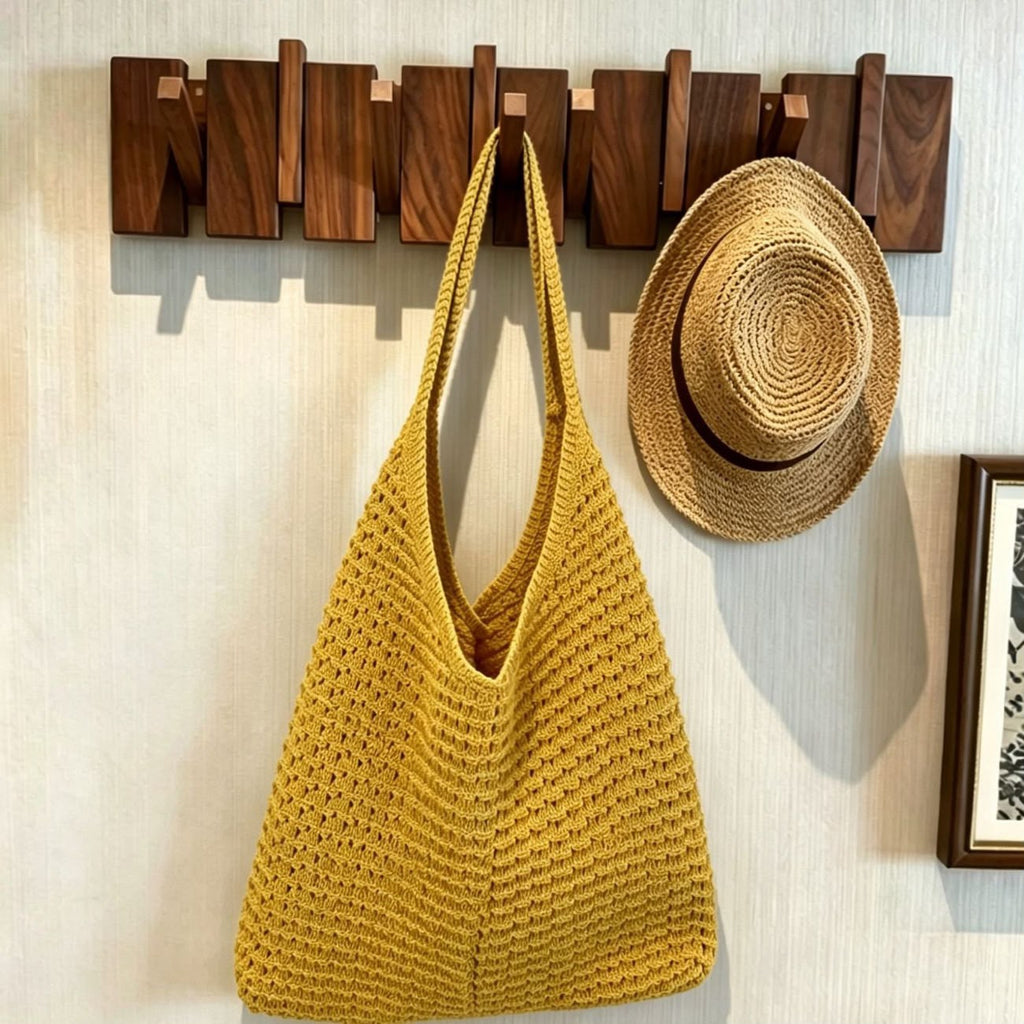 Women's Mustard Yellow Woven Raffia Hobo Bag with Triangular Silhouette
