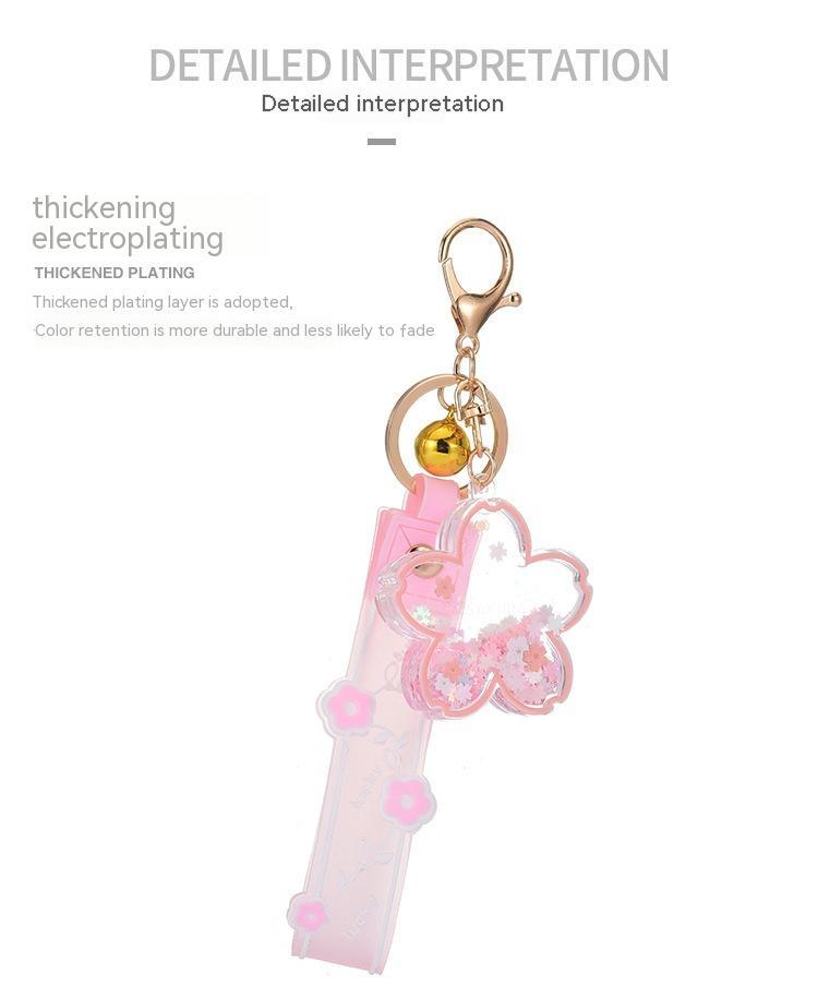 Cartoon-Treibsand-Kirschblüten-Schlüsselanhänger, transparentes Acryl-Öl-Treibflaschen-Taschenanhänger-Set