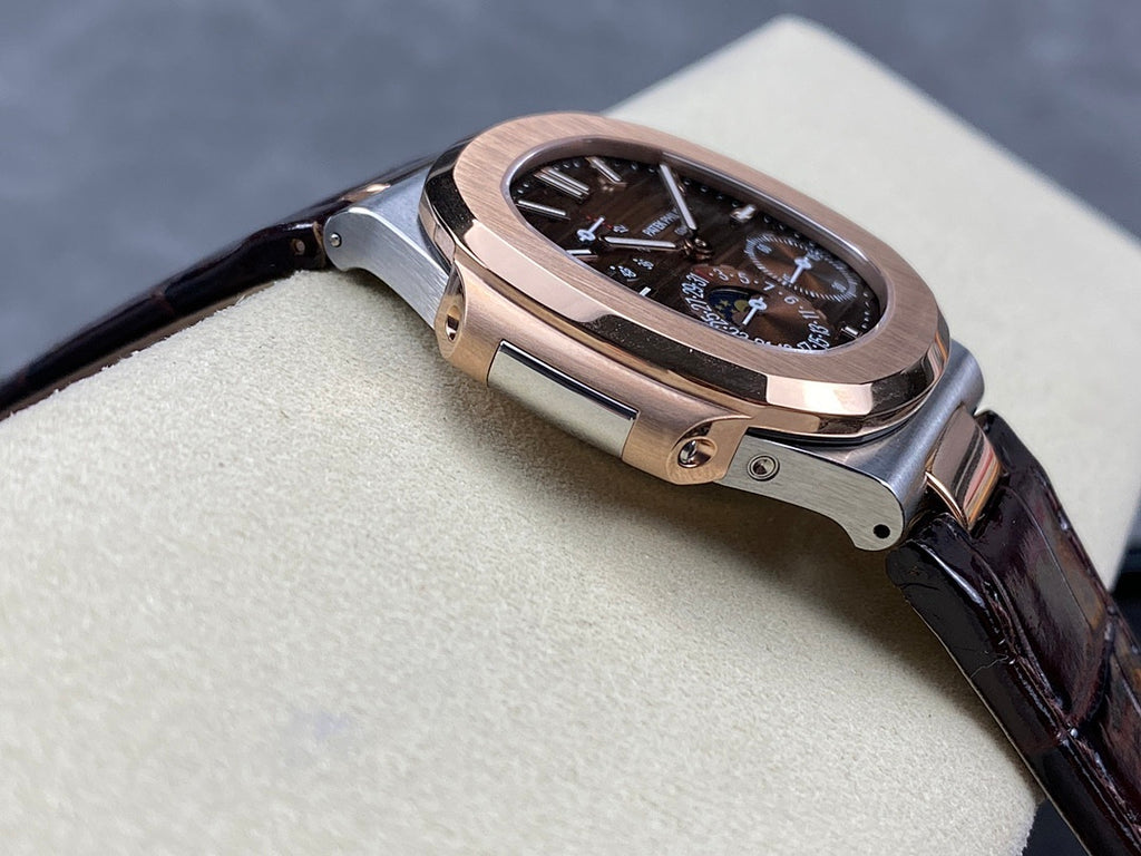 Patek Philippe Nautilus 5712 – Two-Tone Steel Rose Gold Brown Dial Moon Phase Power Reserve Small Seconds Crocodile Strap