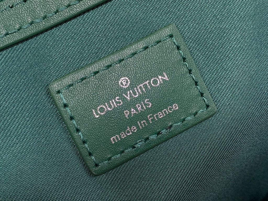 Louis Vuitton Keepall Bandoulière 50 – Green Monogram Canvas Paw Charm Marque Edition