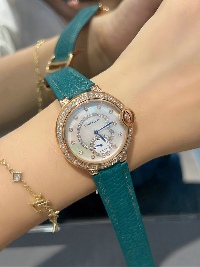 Cartier Ballon Bleu Watch — Diamond Bezel, Mother-of-Pearl & Green Strap