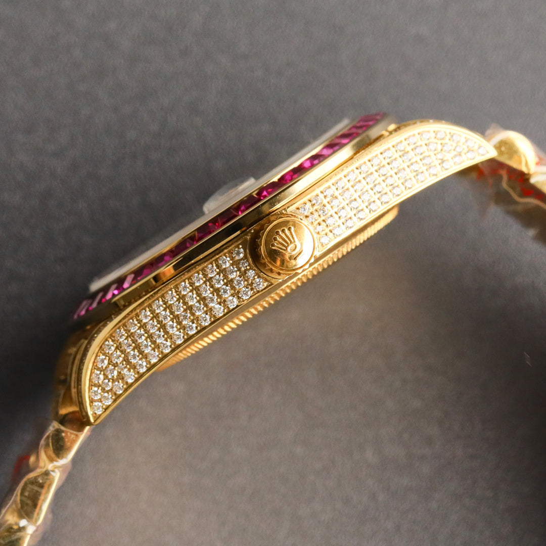 Rolex Day-Date Iced Out – Yellow Gold Diamond Pavé Dial Ruby Baguette Bezel President Bracelet