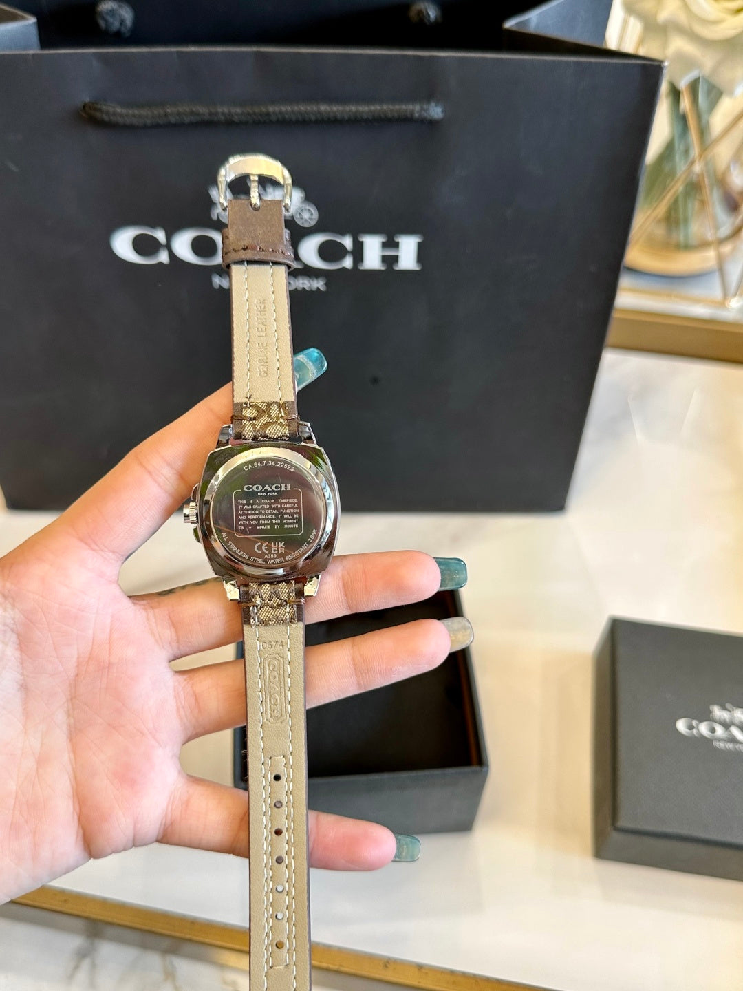Coach Ladies Watch – Crystal Bezel Mother-of-Pearl Signature Canvas Strap
