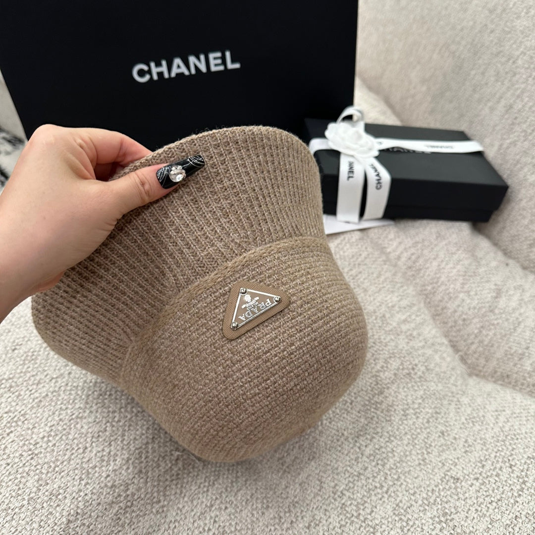 Prada Triangle Logo Ribbed Knit Bucket Hat