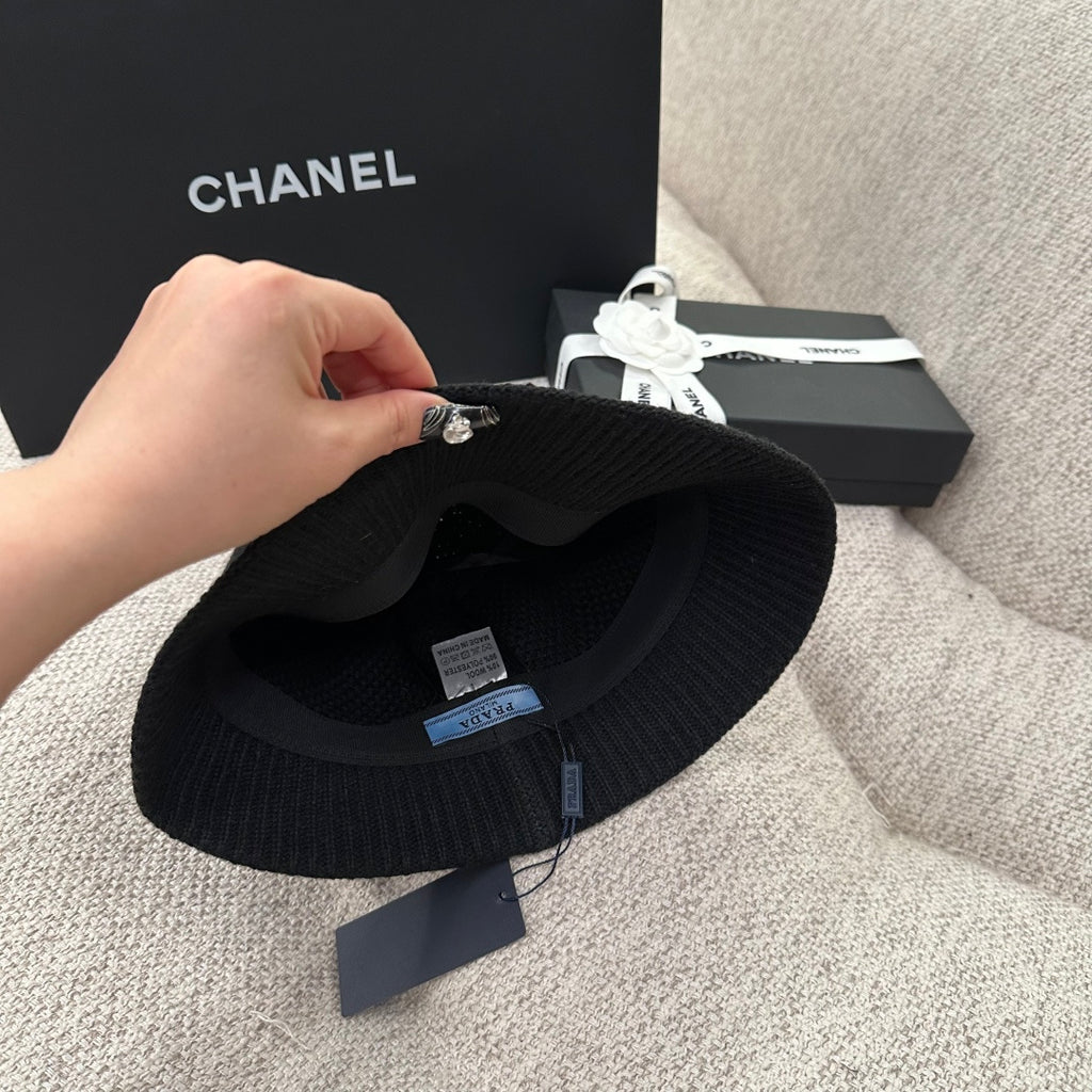 Prada Triangle Logo Ribbed Knit Bucket Hat