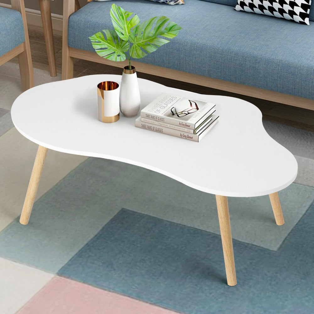 Coffee Table with Cloud-Shaped White Top, Gold-Tone Tapered Legs and Mid-Century Modern Accent Design