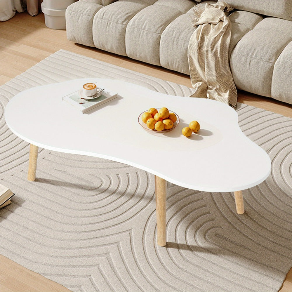 Coffee Table with Cloud-Shaped White Top, Gold-Tone Tapered Legs and Mid-Century Modern Accent Design