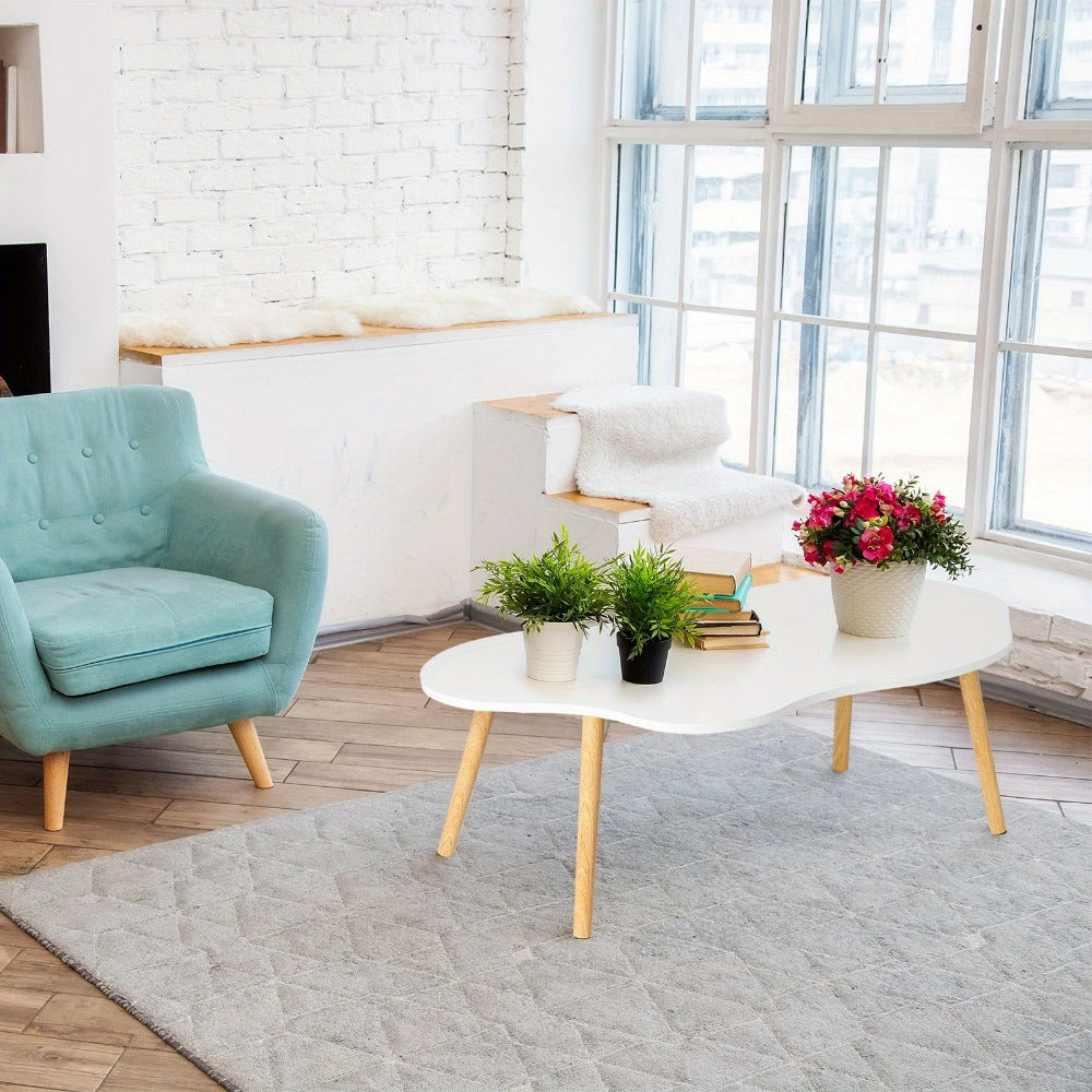 Coffee Table with Cloud-Shaped White Top, Gold-Tone Tapered Legs and Mid-Century Modern Accent Design
