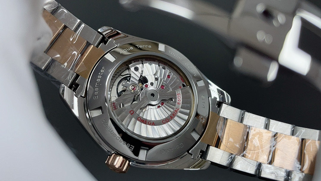 Omega Seamaster Aqua Terra GMT – Two-Tone Steel Rose Gold Brown Teak Dial Red GMT Hand Date Two-Tone Bracelet