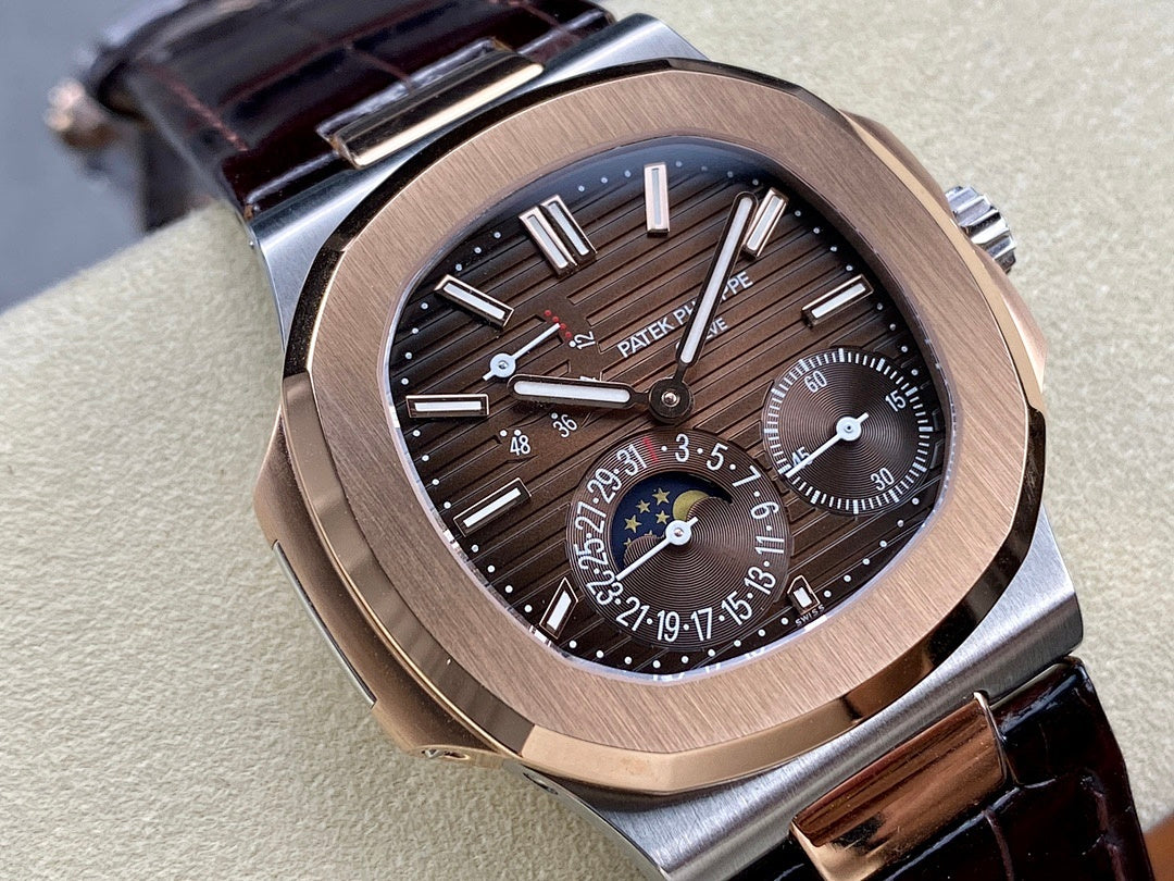 Patek Philippe Nautilus 5712 – Two-Tone Steel Rose Gold Brown Dial Moon Phase Power Reserve Small Seconds Crocodile Strap