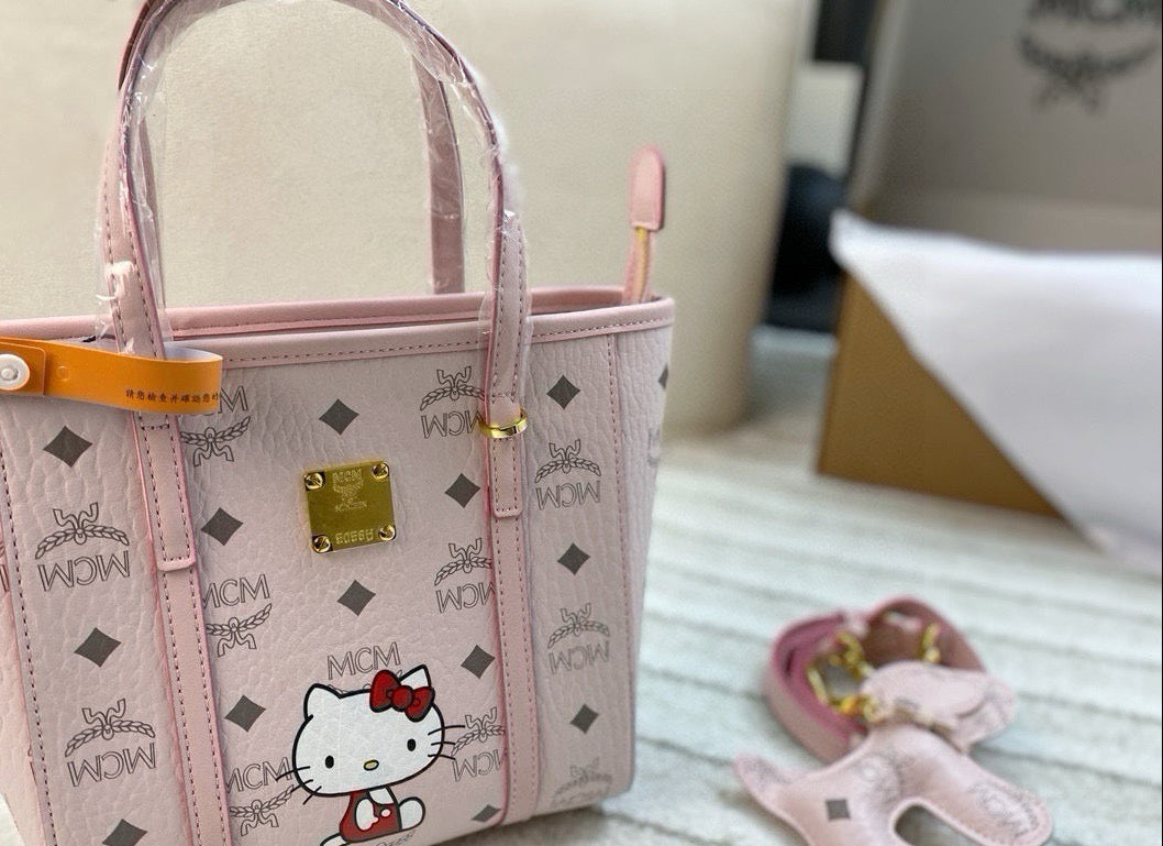 MCM x Hello Kitty Mini Tote Bag – Blush Pink Visetos