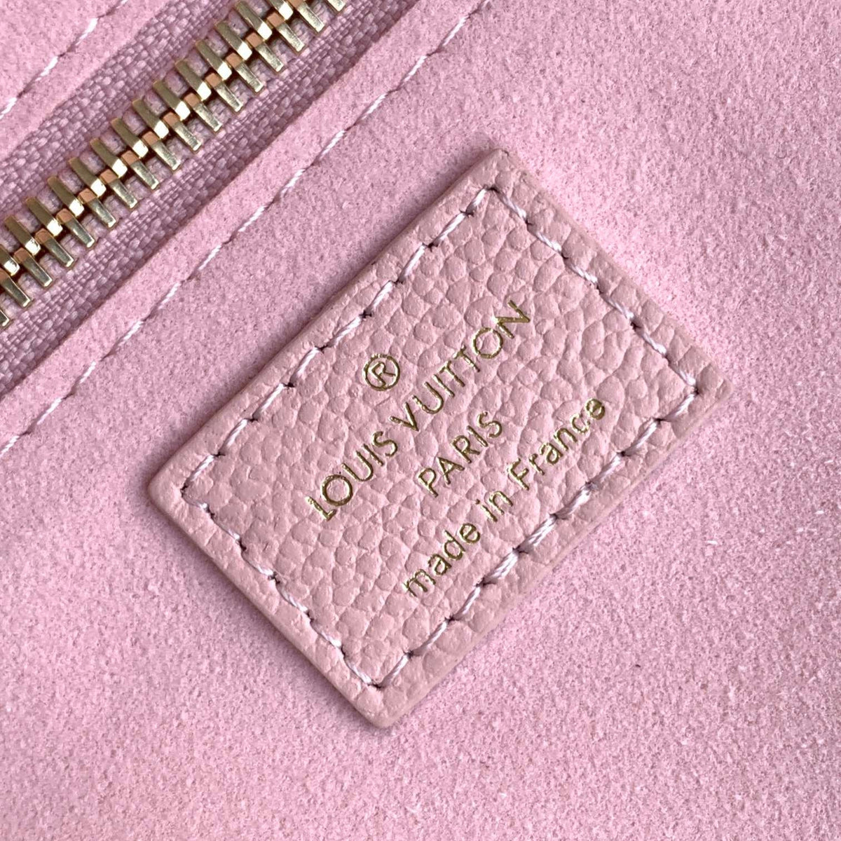 NEVERFULL MM TASCHE 32 IN ROSA UND BEIGE AUS GEPRÄGTEM RINDLEDER