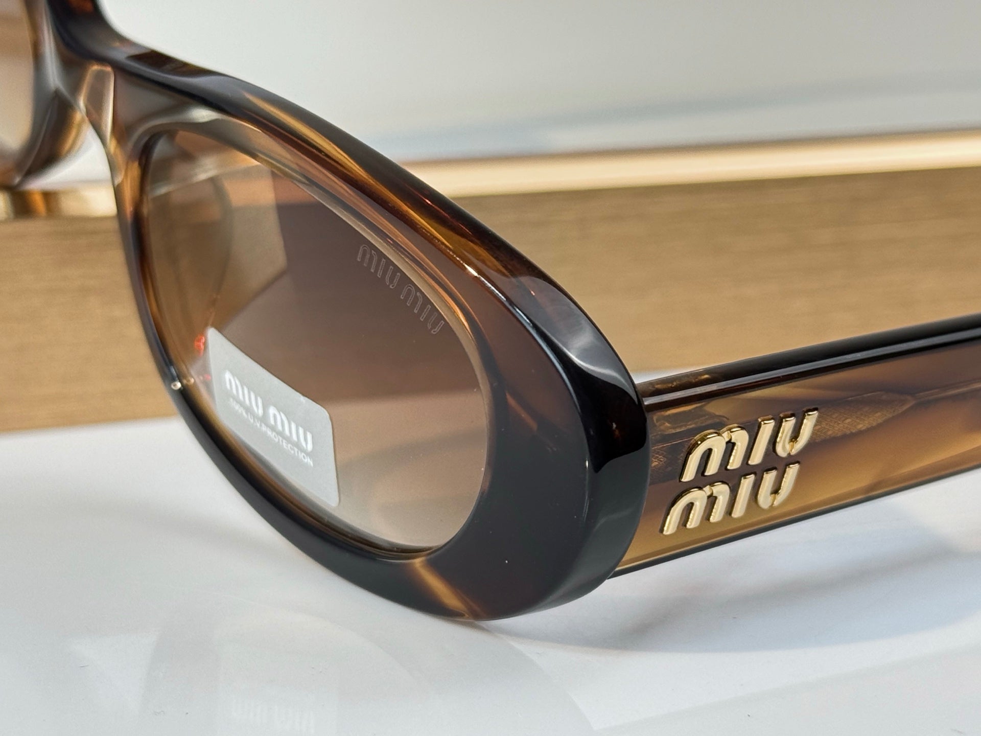 Miu Miu MU C02S Oval Wrap Sunglasses