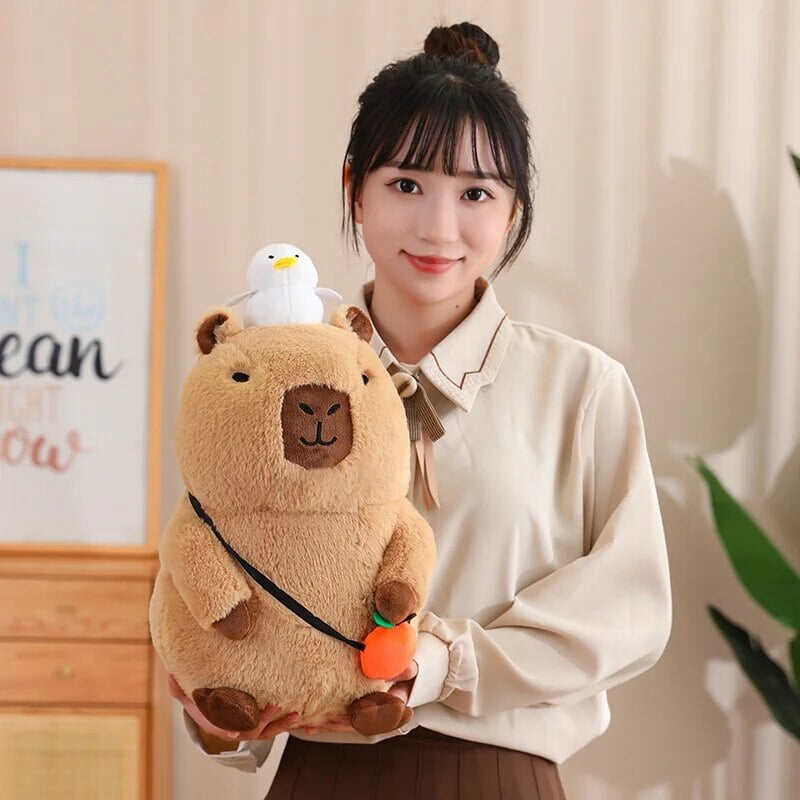 Fluffy Sleepy Capybara with Orange Plushie